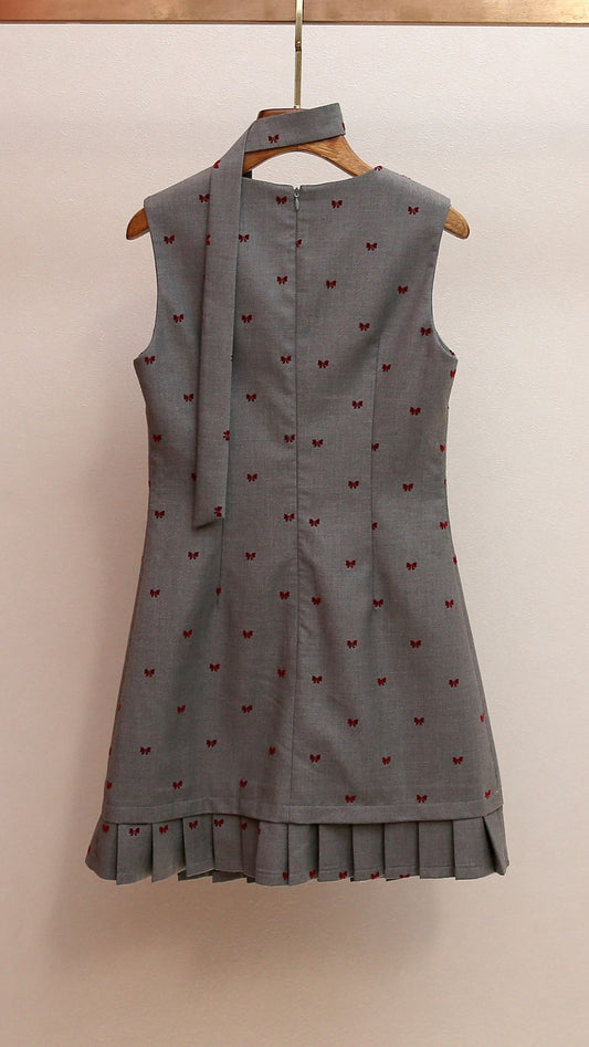 AIIZIE HARUYE PLAYFUL BOW PRINT SLEEVELESS MINI DRESS | SCALLOPED V-NECK & PLEATED HEM - product image