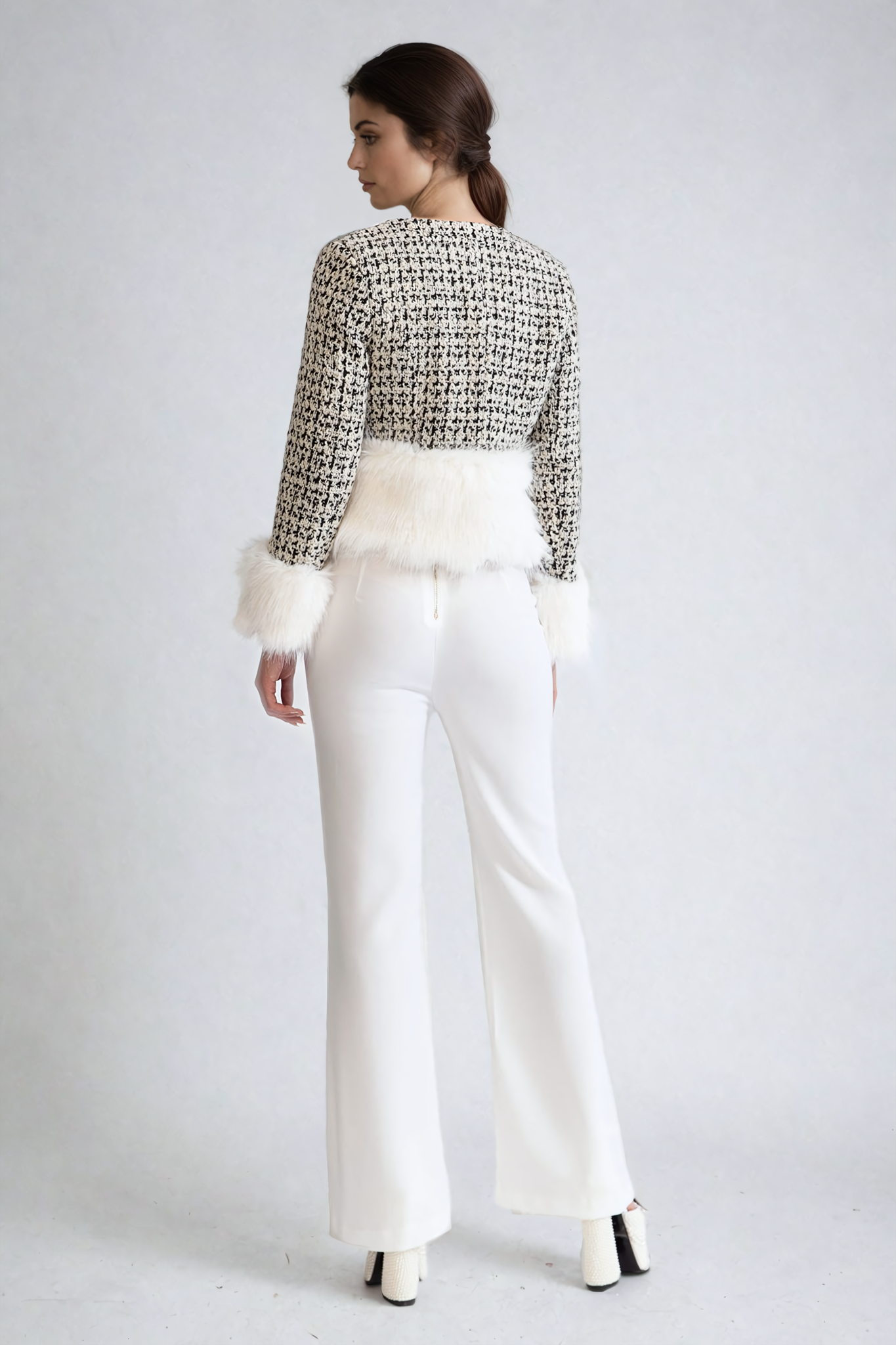 Giacca in tweed con dettagli in pelliccia sintetica