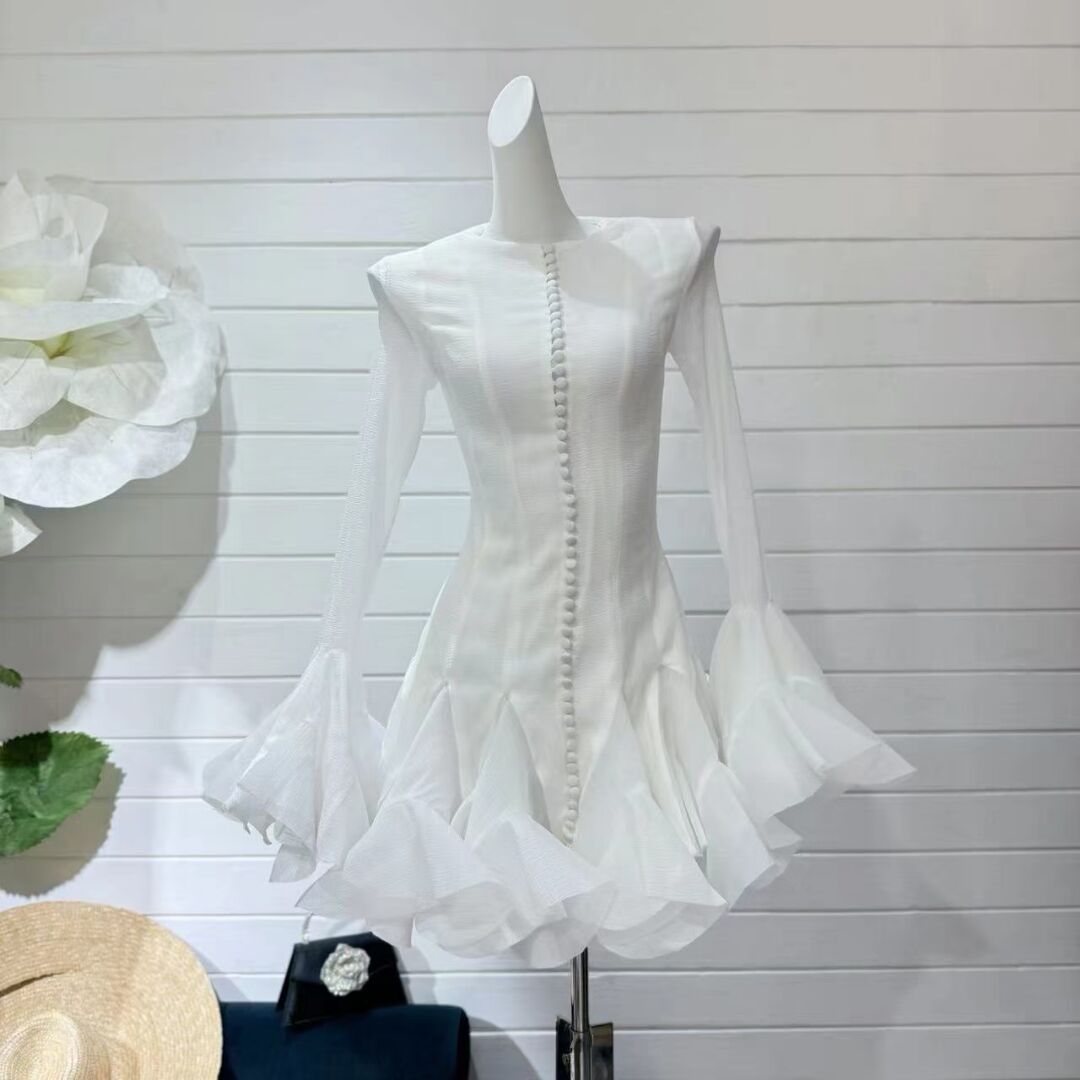 AGATHA WEISSES HALBTRANSPARENTES AUSGESTELLTES MINIKLEID