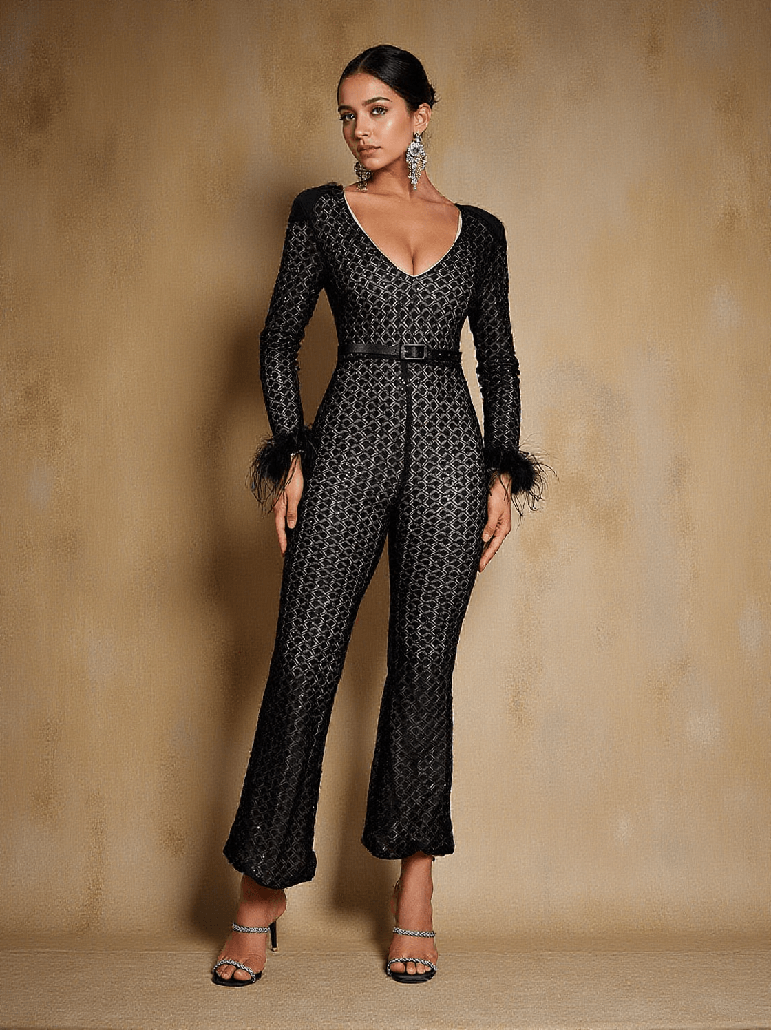 Orwell – Langärmliger Jumpsuit mit Federn