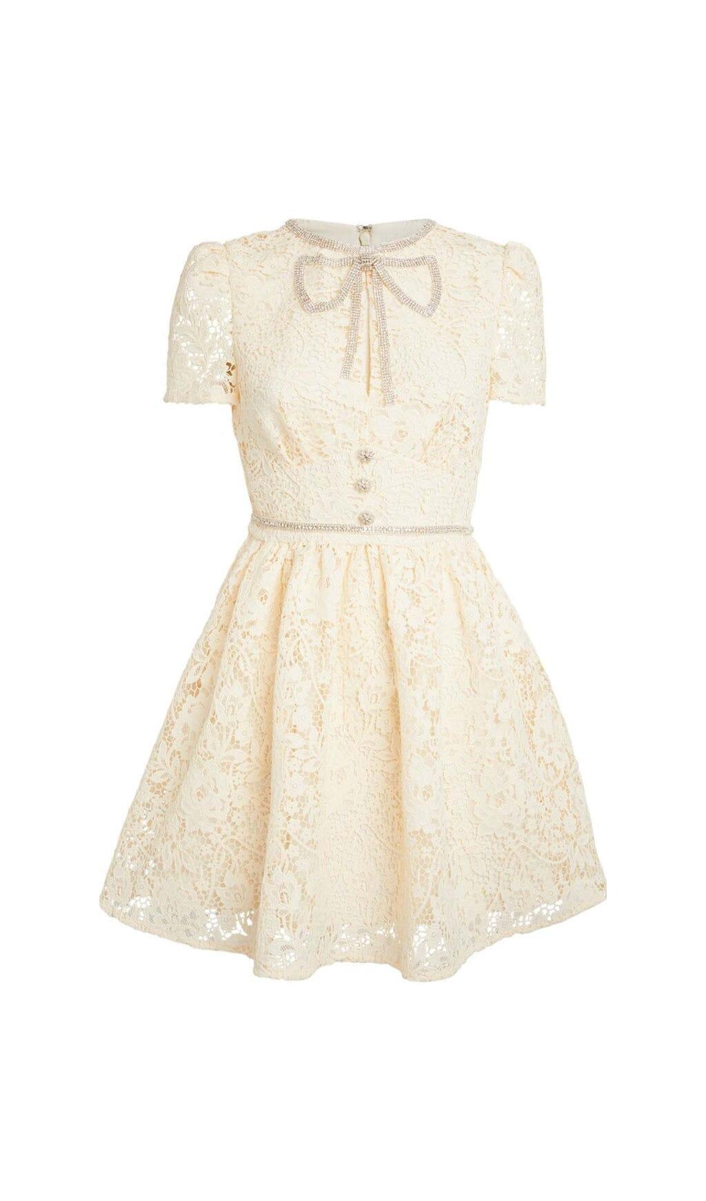 MINIKLEID MIT SPITZENSCHLEIFE IN CREMEGELB