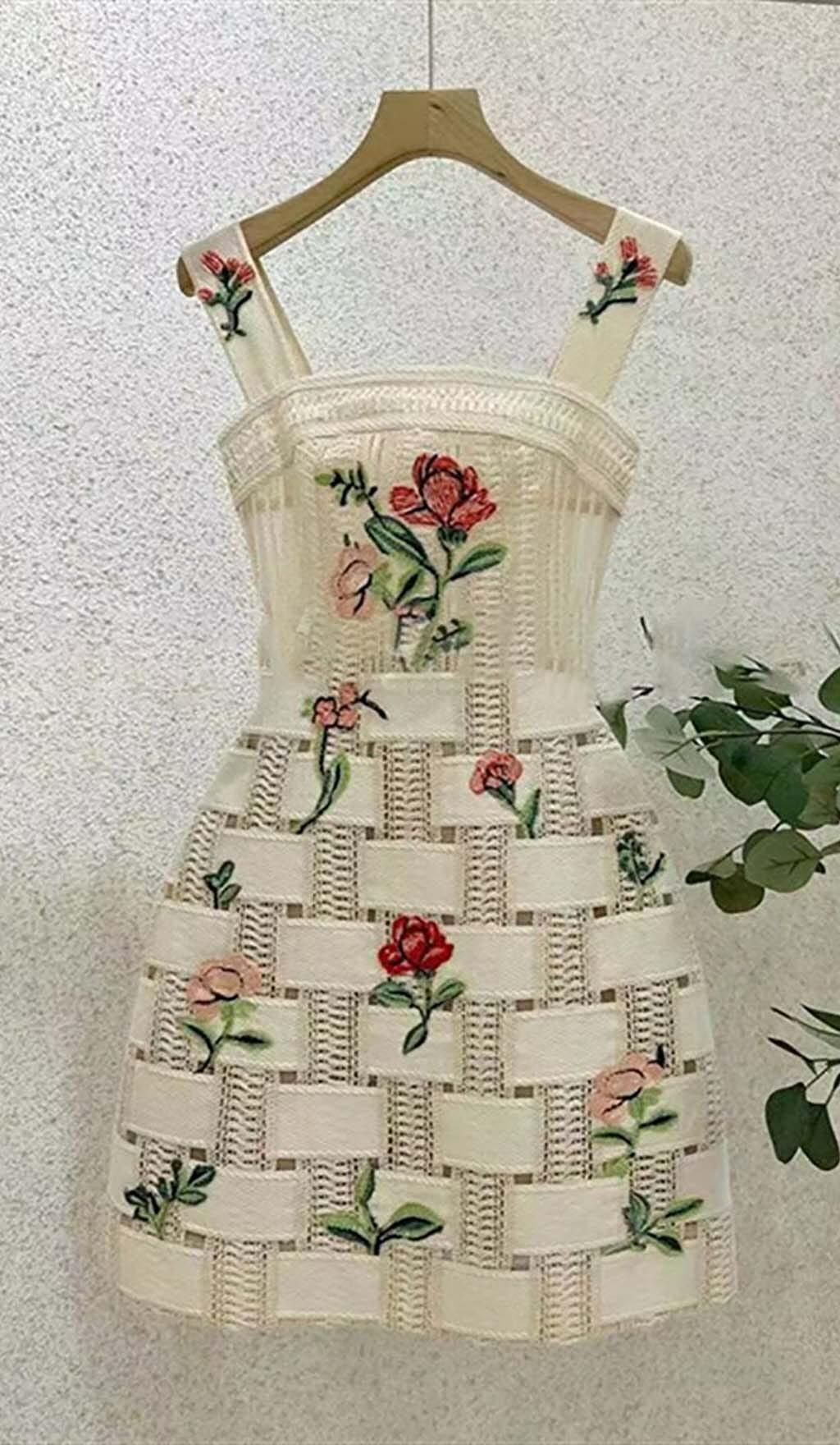 MINI ABITO CON SPALLINE E STAMPA FLOREALE IN BIANCO