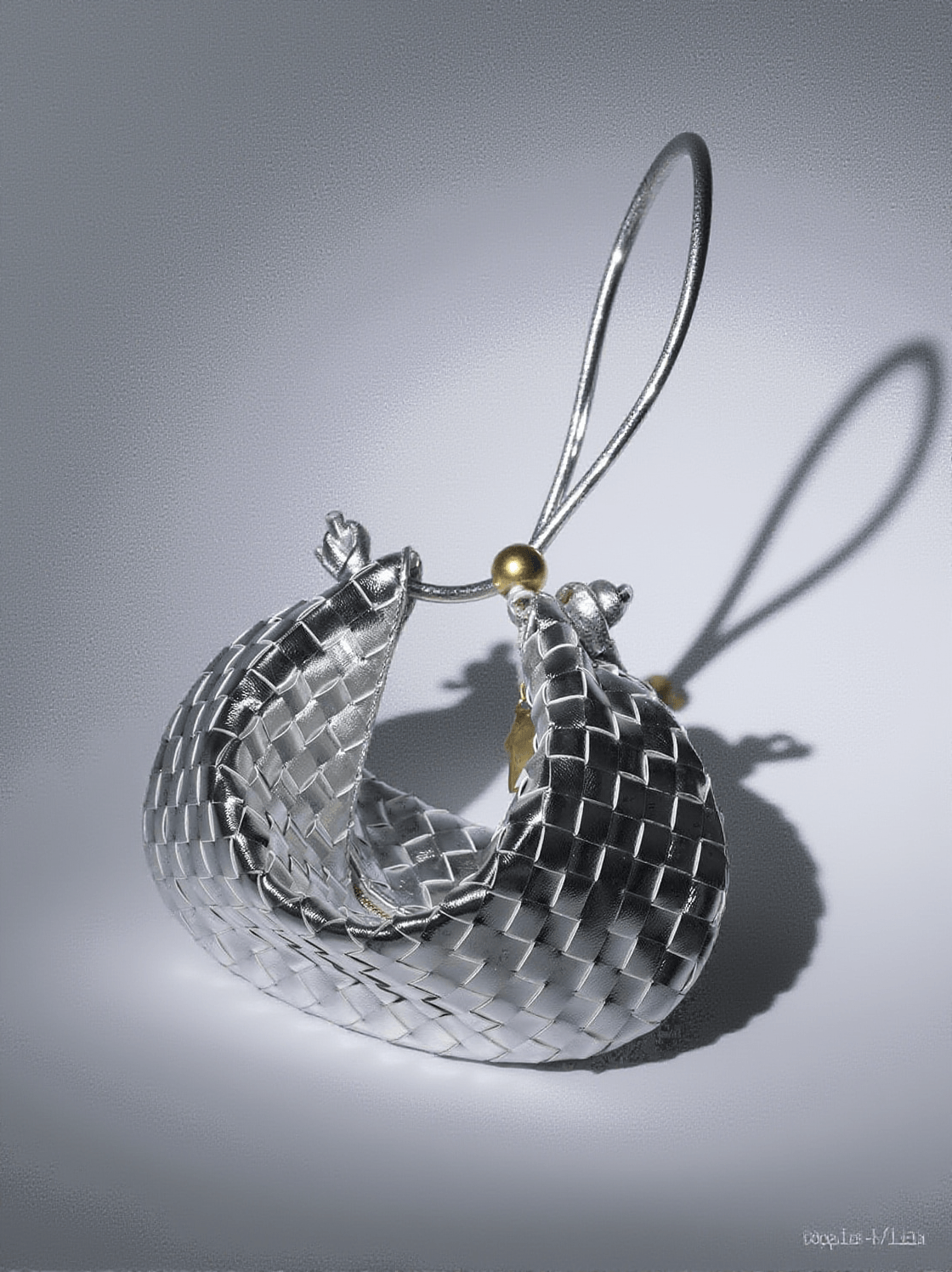 MIDGE WOVEN DRAWSTRING BAG IN SILVER