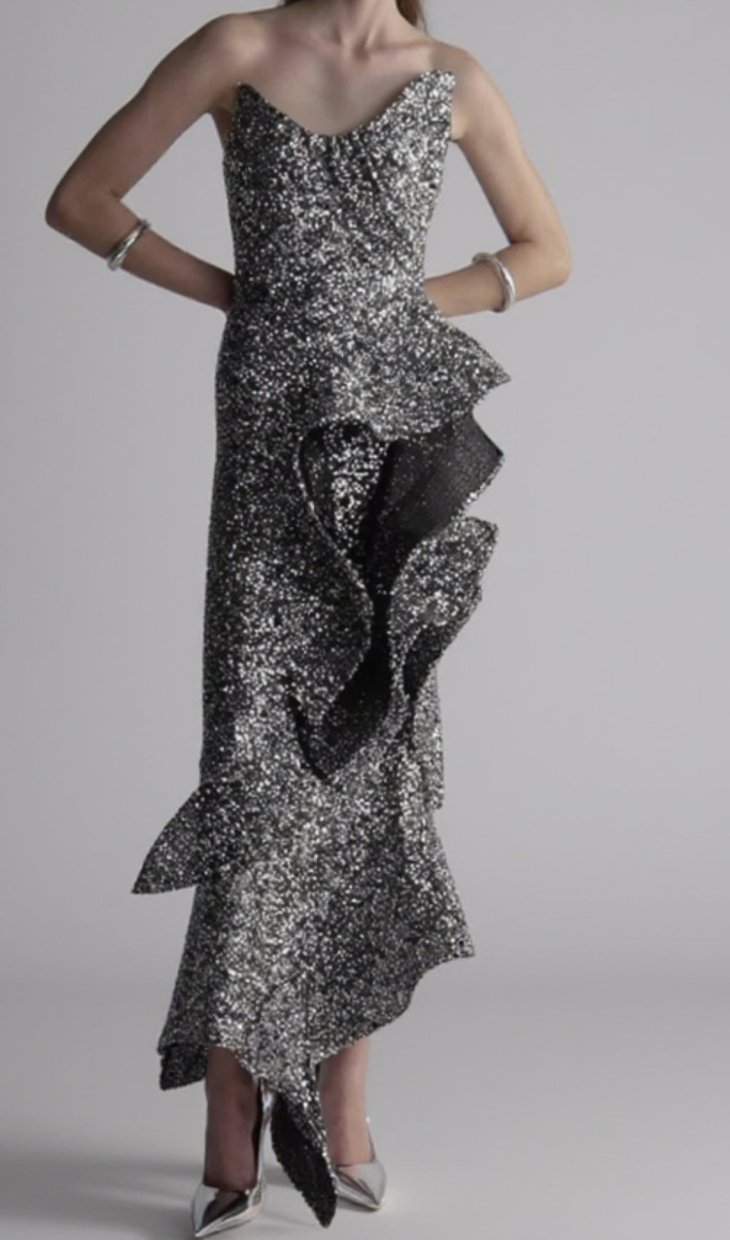 ASYMMETRIC RUFFLED SEQUINED CREPE GOWN IN SILVER