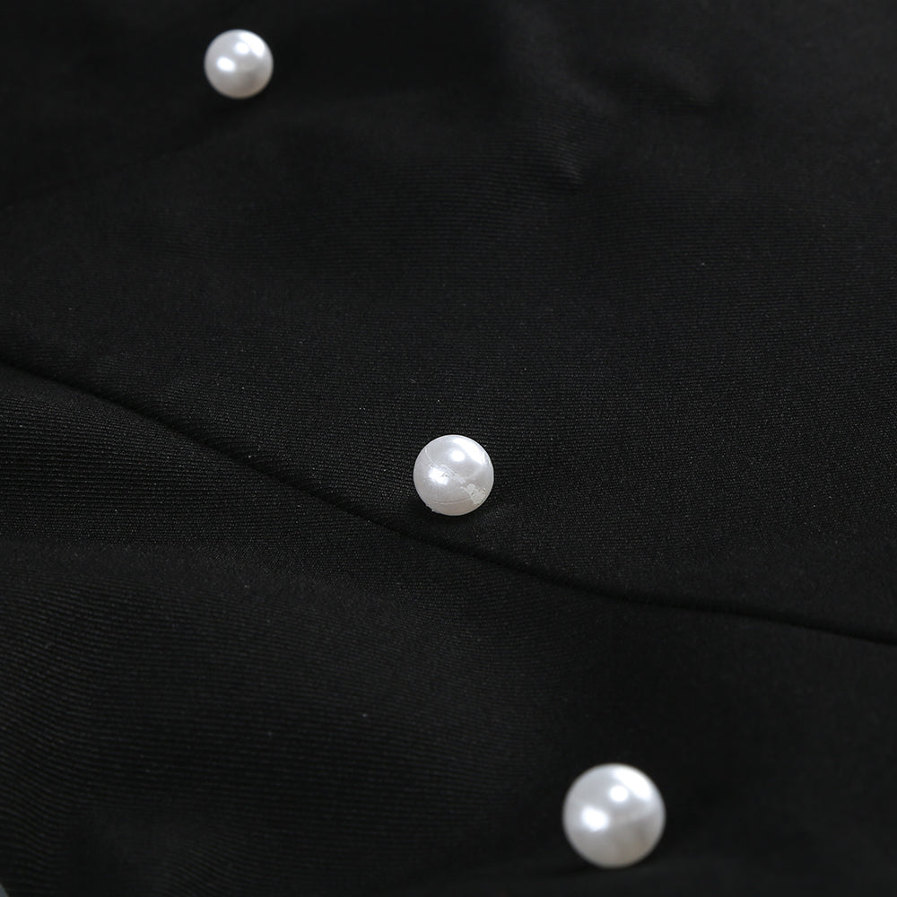 Schwarz-weißes Minikleid mit Perlen 
