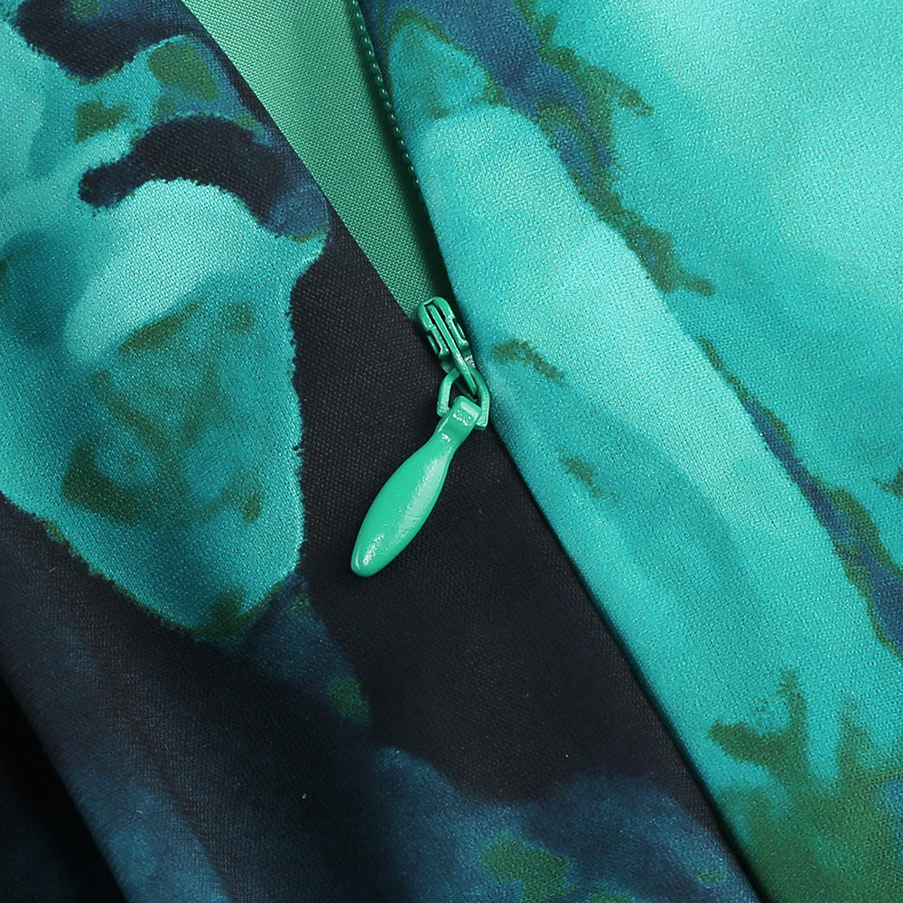 ABITO CON APERTURA SUL PETTO E ABITO MIDI VERDE
