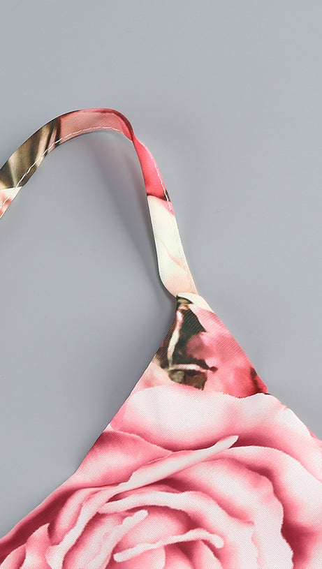 Rosa bedrucktes Midikleid mit offenem Rückenschlitz und ausgehöhlter Vorderseite