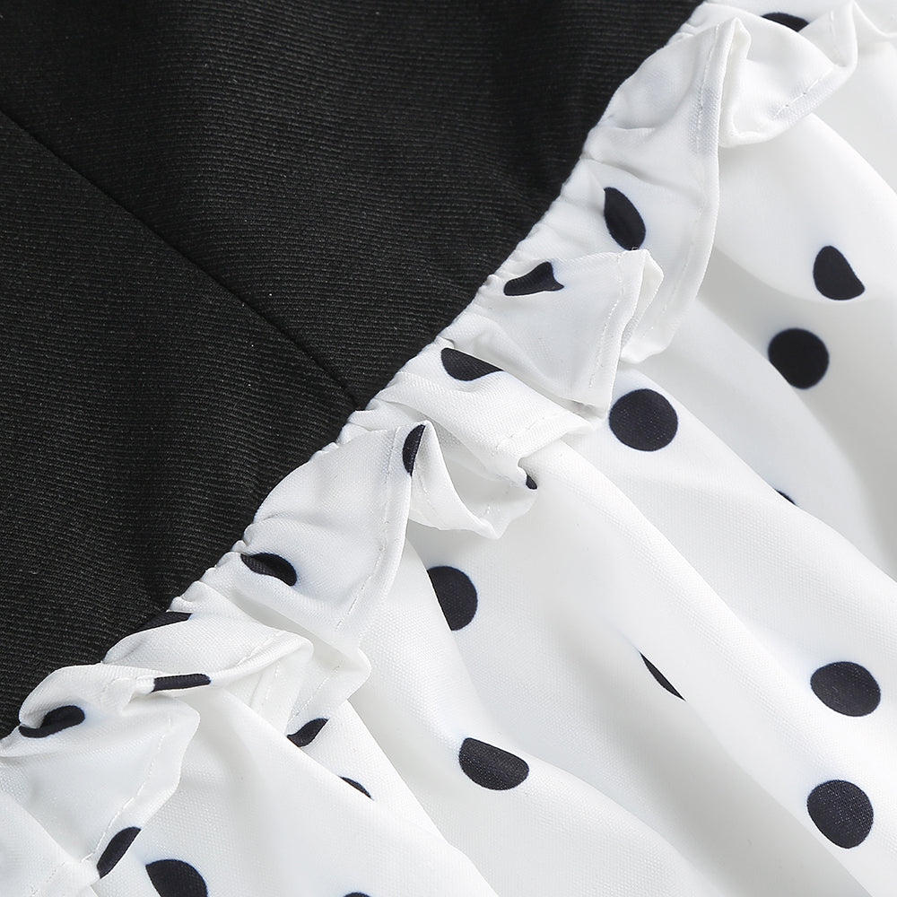 Schwarz-weißes Minikleid mit Perlen 