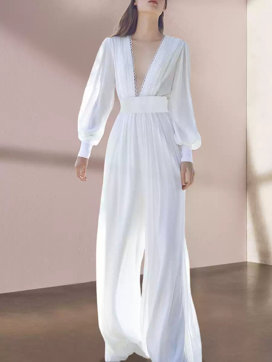 Weißer Maxi-Jumpsuit mit langen transparenten Ärmeln und hohem Halsausschnitt 