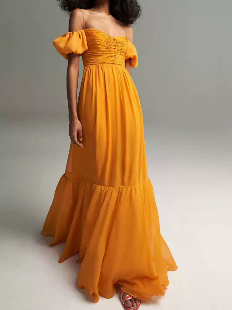 Gelbes schulterfreies Chiffon-Maxikleid mit Puffärmeln 