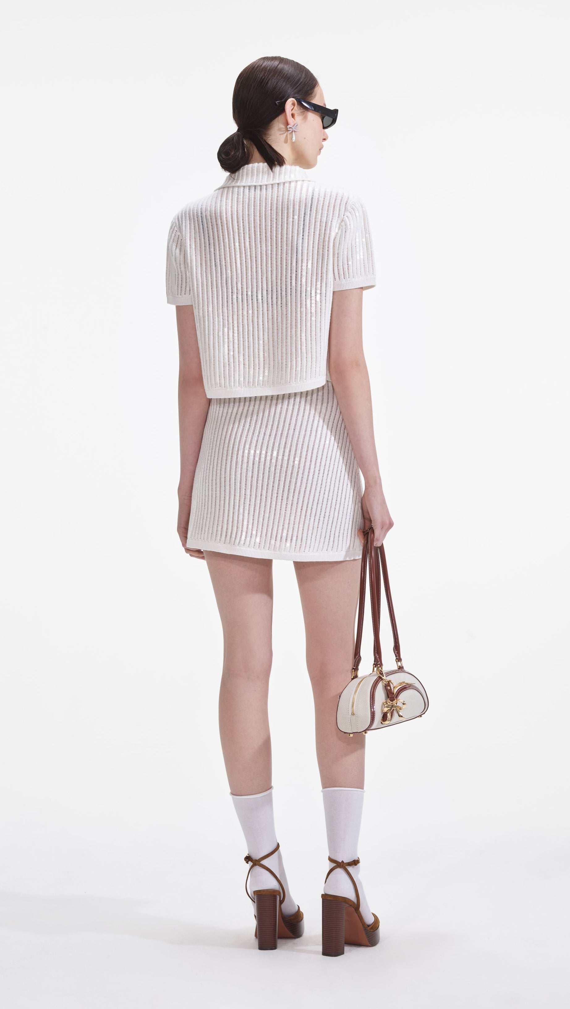 Weißer Häkel-Minirock mit Pailletten