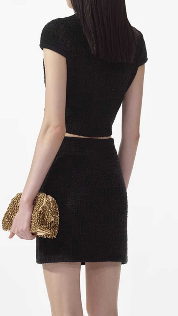 AIIZIE JEWEL BUTTONS KNITTED MINI SKIRT IN BLACK - product image