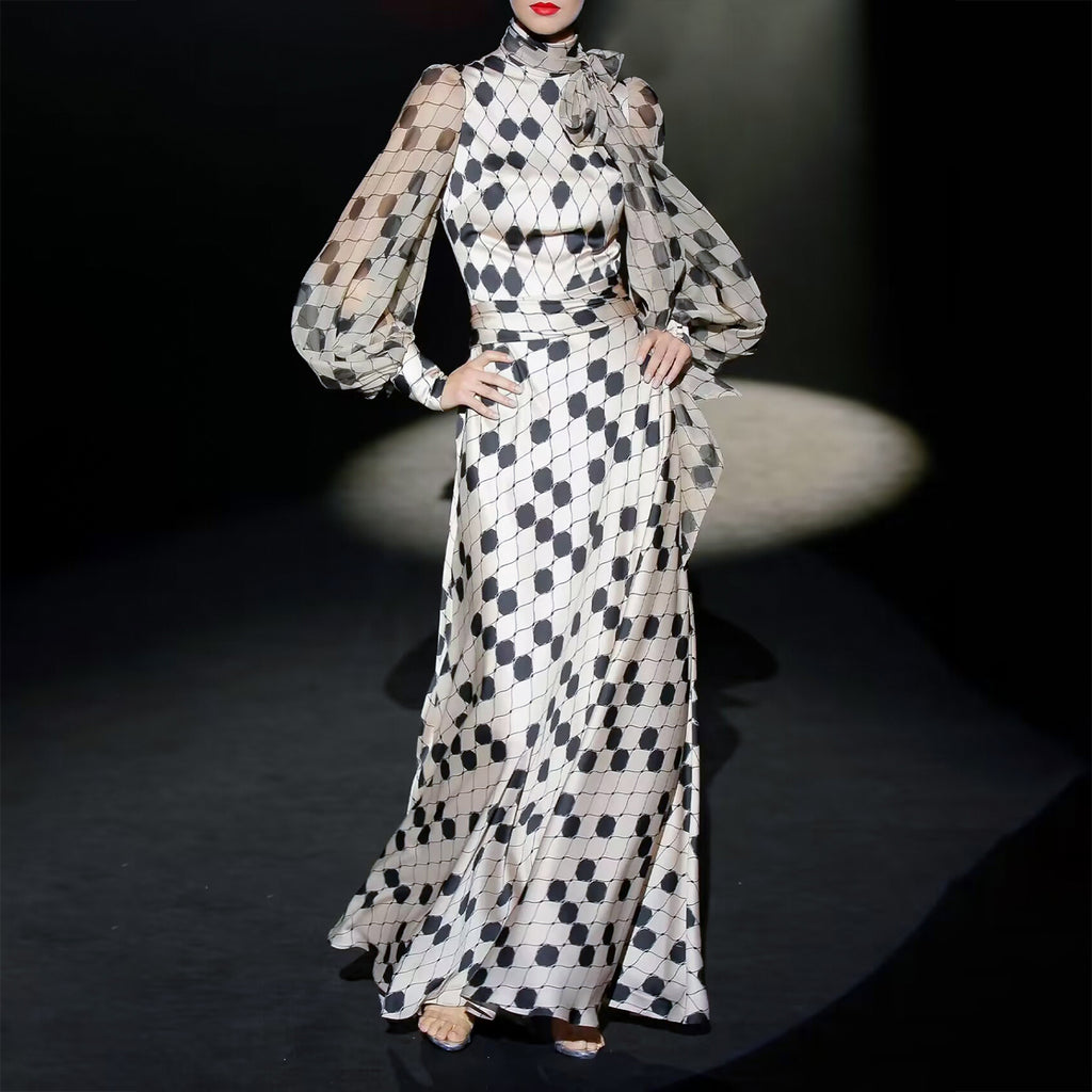 ABITO IN RASO A POIS CON MANICHE TRASPARENTI E SCOLLATURA A FIOCCO