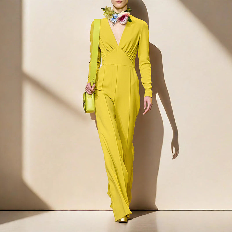 Gelber Jumpsuit mit V-Ausschnitt, langen Ärmeln und weitem Bein 