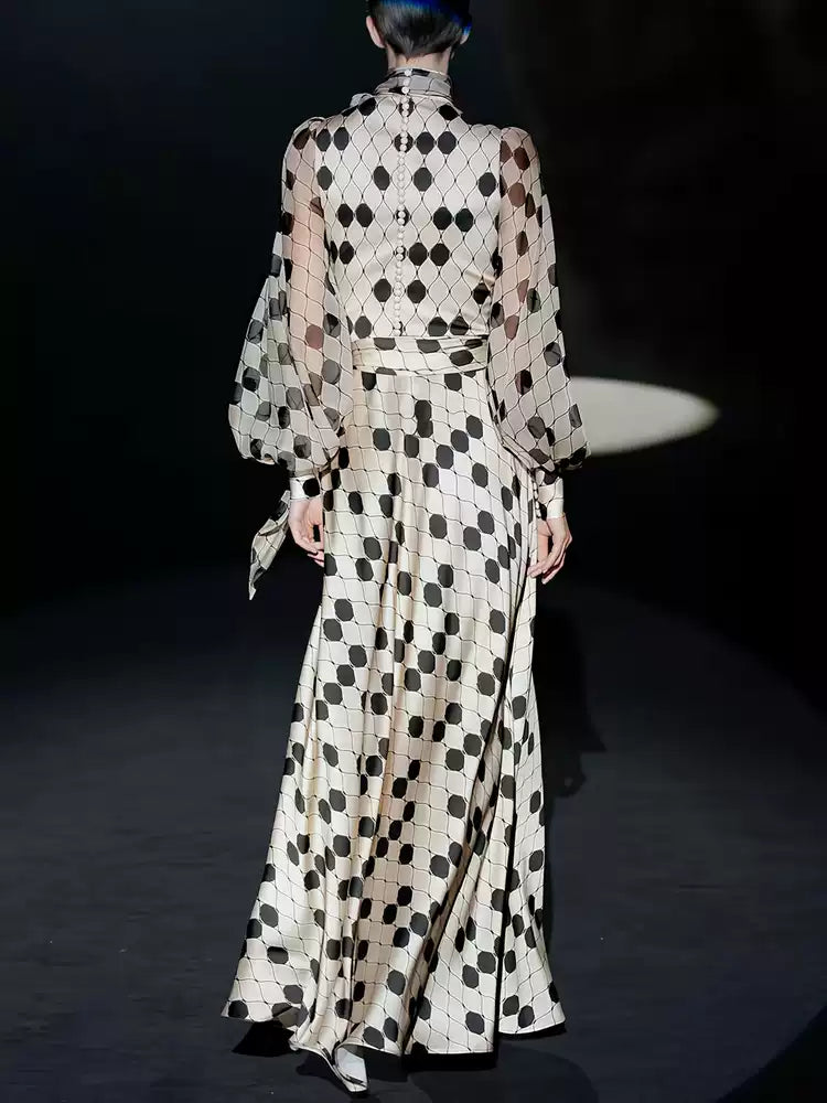 AIIZIE POLKA DOT SATIN GOWN WITH SHEER SLEEVES & BOW NECKLINE - product image