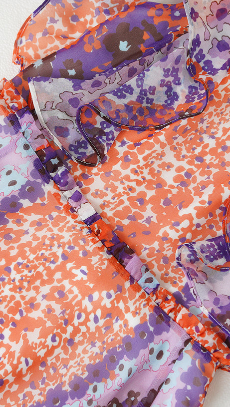 ELEGANT FLORAL LONG DRESS WITH RUFFLED NECKLINE AND SLEEVELESS DESIGN