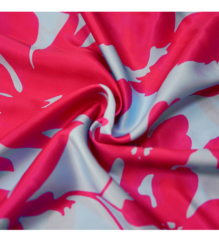 ELEGANT FLORAL WRAP DRESS WITH RUFFLED HEM AND SHEER DETAILS