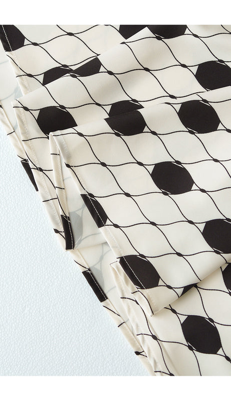 POLKA DOT SATIN GOWN WITH SHEER SLEEVES & BOW NECKLINE