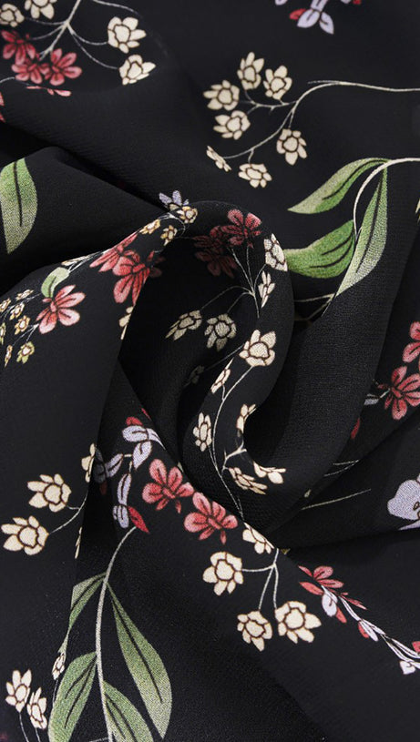 Schwarzes Maxikleid mit Blumenmuster, transparenten Ärmeln und Spitzendetails 