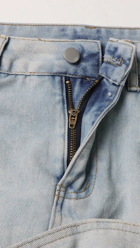 ERIN JEANSROCK MIT SAURE-WASH-RÜSCHEN