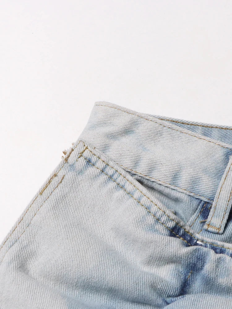 ERIN JEANSROCK MIT SAURE-WASH-RÜSCHEN