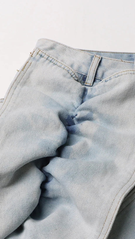 ERIN JEANSROCK MIT SAURE-WASH-RÜSCHEN