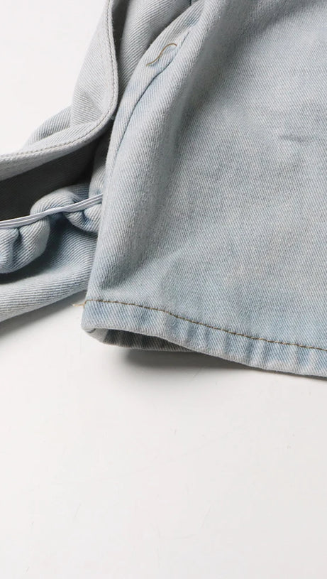 ERIN JEANSROCK MIT SAURE-WASH-RÜSCHEN