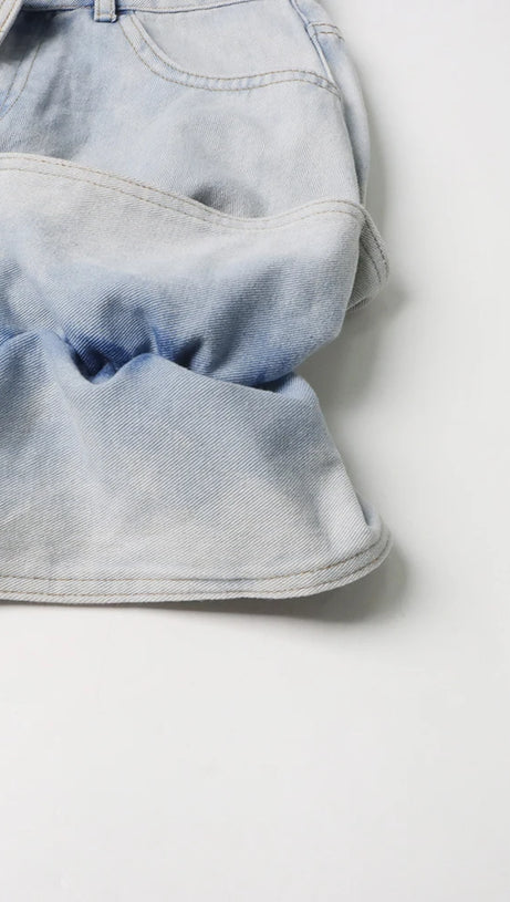 ERIN JEANSROCK MIT SAURE-WASH-RÜSCHEN