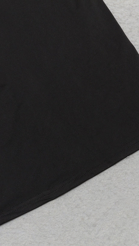 ABITO ADERENTE CON VOLANT E SPALLE SCOPERTE 