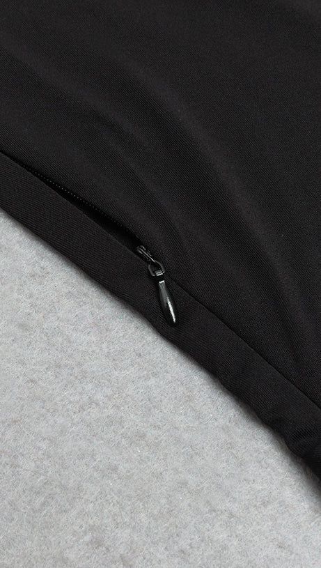 ABITO ADERENTE CON VOLANT E SPALLE SCOPERTE 