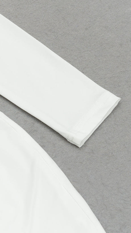 ABITO BIANCO CON MONOMANICA E VITA A TORSIONE