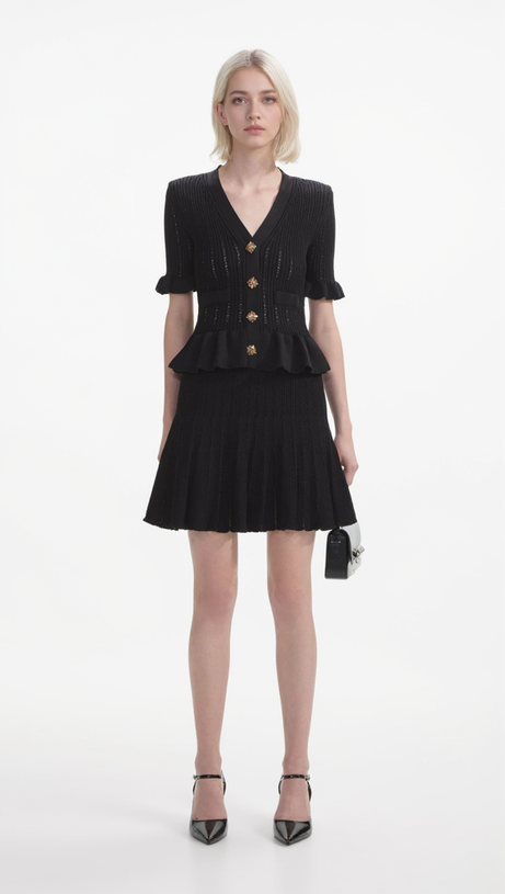 URSULA BLACK KNIT PEPLUM MINI DRESS