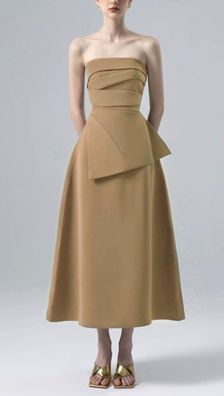 PLEATED ASYMMETRIC TUBE MIDI DRESS IN KAHKI