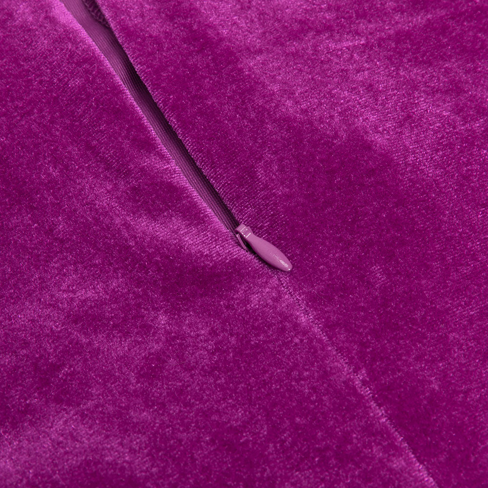 AUSGEHÖHLTES KLEID AUS SAMT MIT FISCHSCHWANZ UND LOTUSÄRMELN 