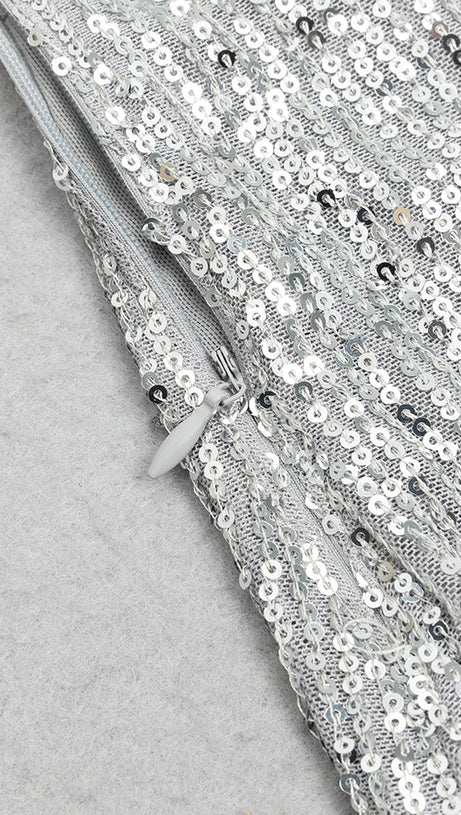 ABITO ADERENTE CON SPACCHIO E PAILLETTES ARGENTO CON SCOLLO A V