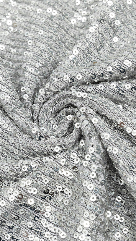 ABITO ADERENTE CON SPACCHIO E PAILLETTES ARGENTO CON SCOLLO A V