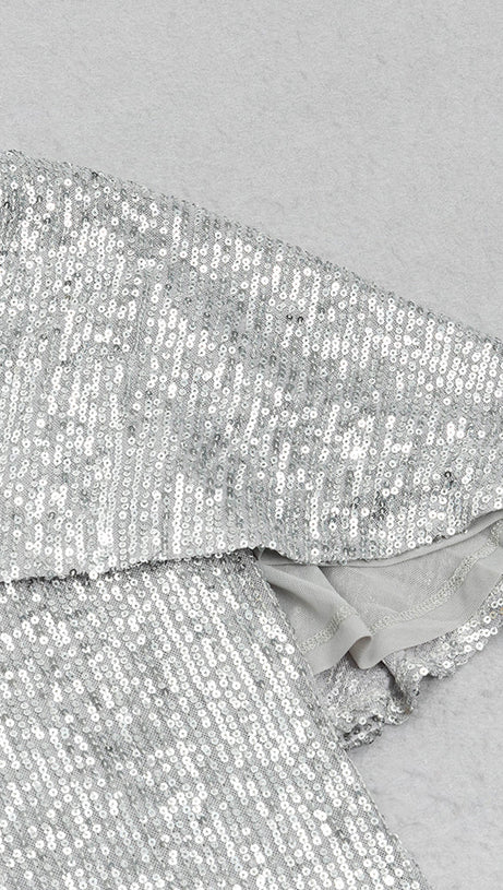 ABITO ADERENTE CON SPACCHIO E PAILLETTES ARGENTO CON SCOLLO A V