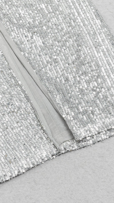 ABITO ADERENTE CON SPACCHIO E PAILLETTES ARGENTO CON SCOLLO A V