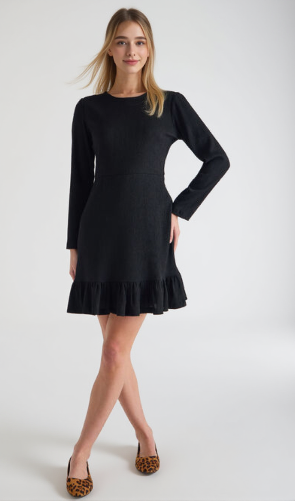 Gestricktes, transparentes, ausgestelltes Minikleid in Schwarz