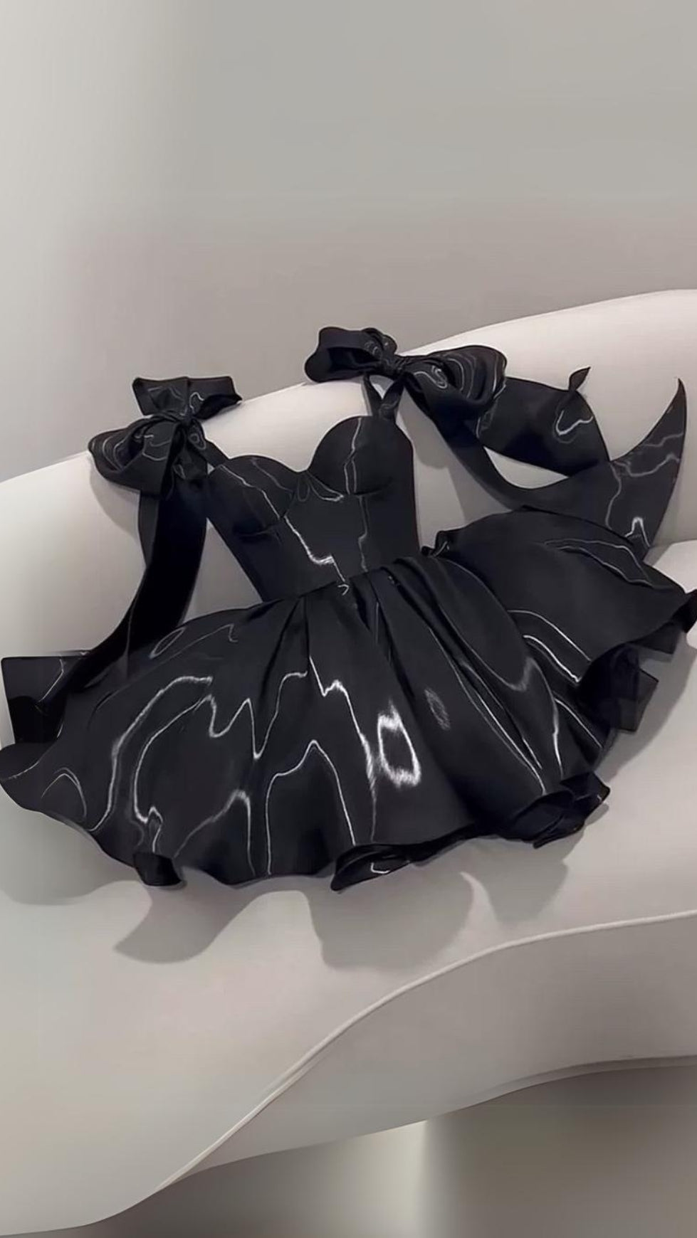 BLACK BOW PUFFY MINI DRESS