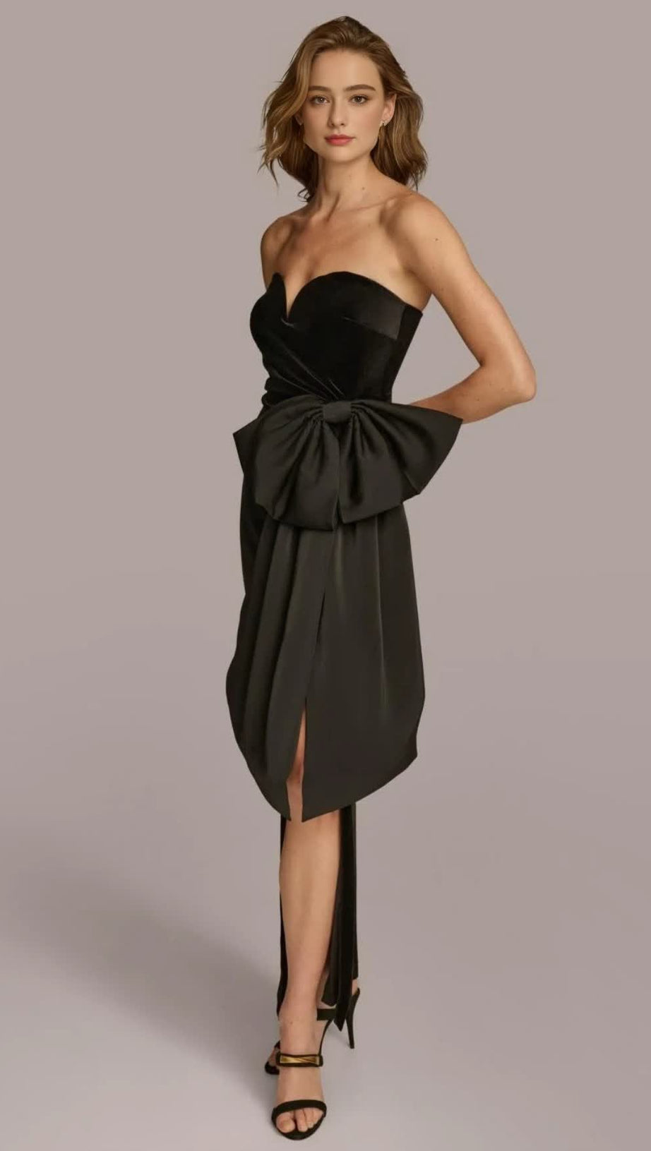 BOW IRREGULAR ASYMMETRIC SLEEVELESS MIDI DRESS IN BLACK