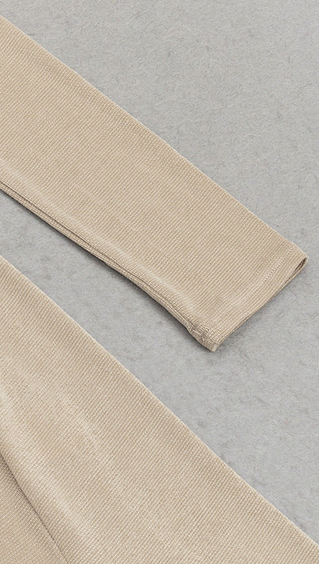 ABITO LUNGO DRAPPEGGIATO A MANICHE LUNGHE COLOR NUDO 