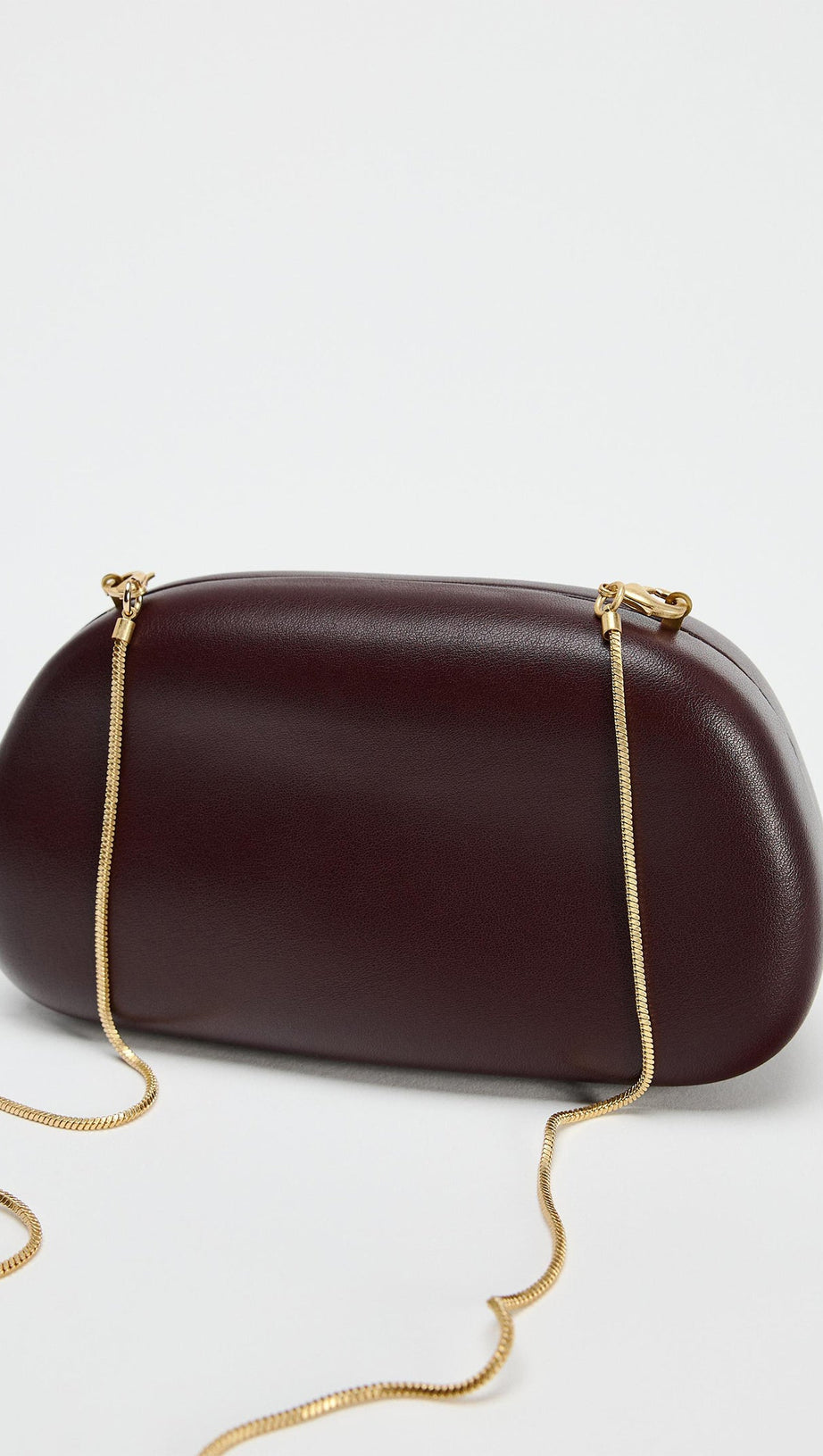 CURVED METAL BOX BAG IN BURGUNDY