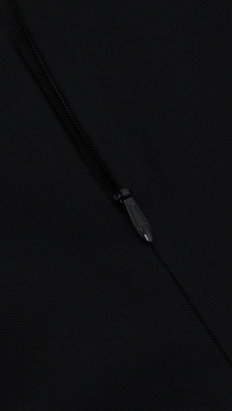 Schwarzes Bandagekleid mit Spitzenknöpfen vorn und Meerjungfrauen-Saum