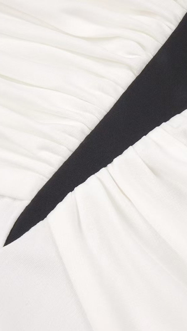 HIGH-CONTRAST HALTER MAXI GOWN WITH SCULPTURAL RUCHING