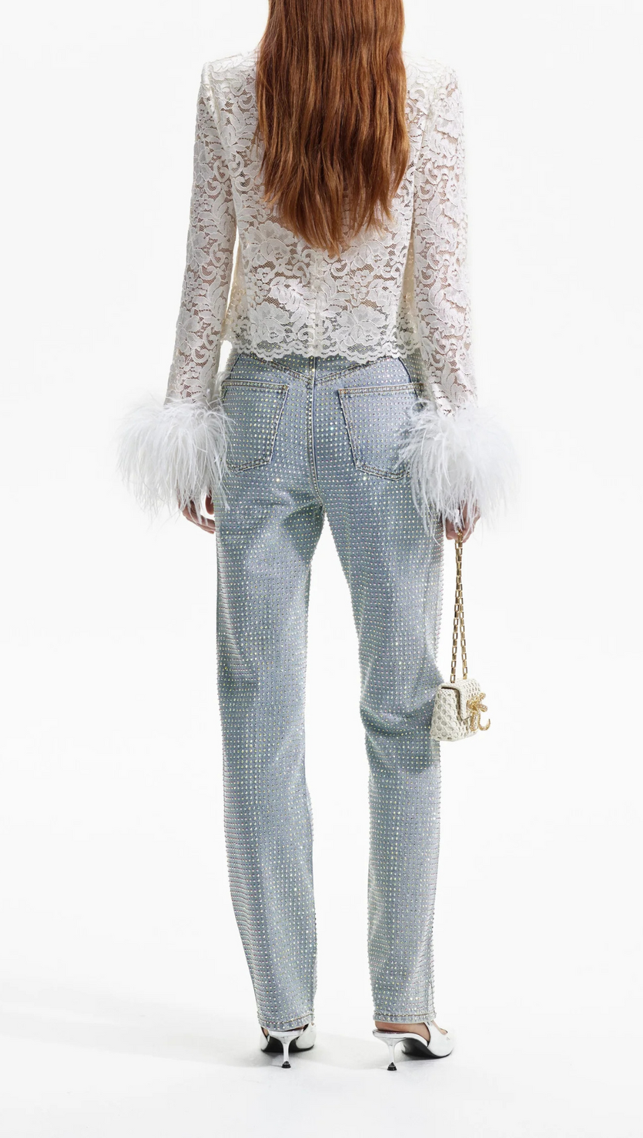 Cremefarbenes Top mit Cord-Spitze und Federn 