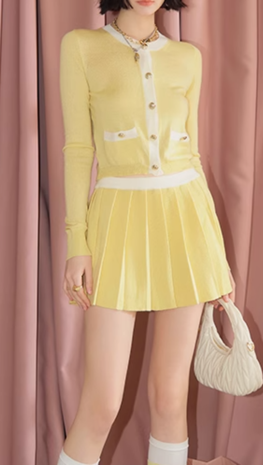 GONNA MINI A LINEA A PLISSETTATA IN MAGLIA