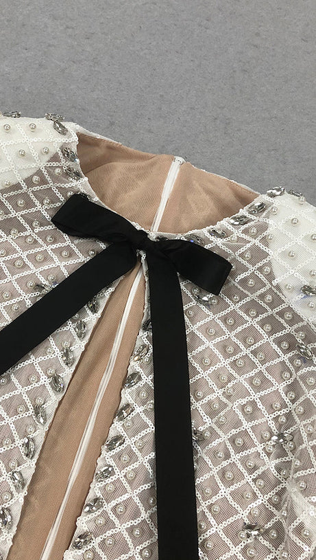 PEARL EMBELLISHED CUT OUT MINI DRESS IN BEIGE