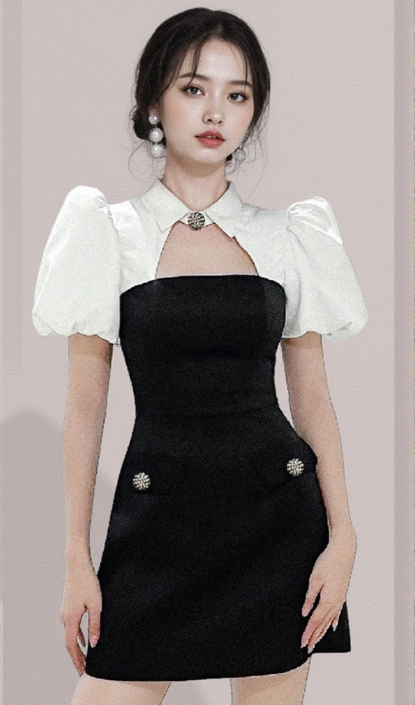 MINIKLEID MIT PUFFÄRMELN UND CUTOUTS IN SCHWARZ