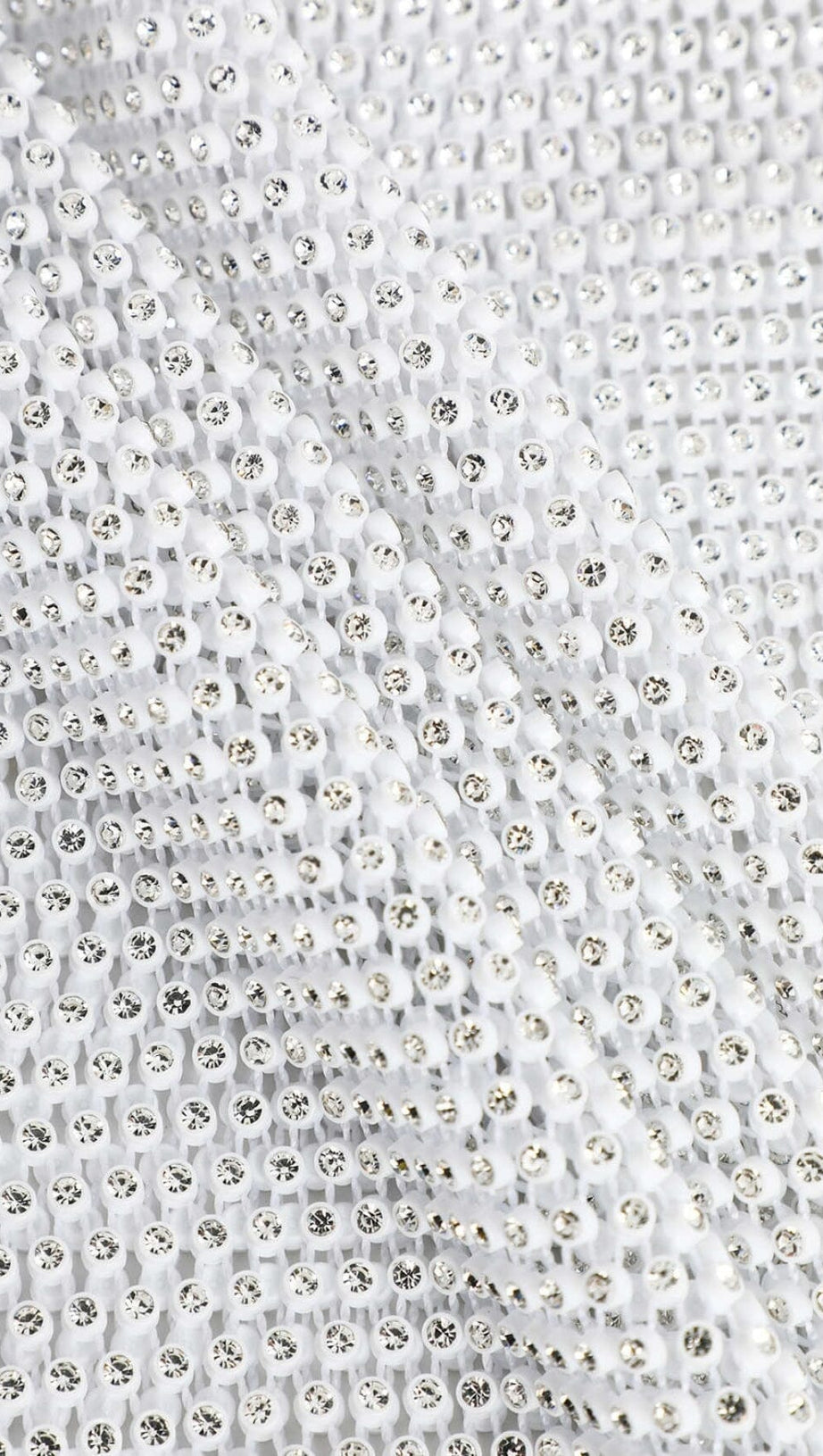 MINIKLEID AUS MESH MIT FEDERN